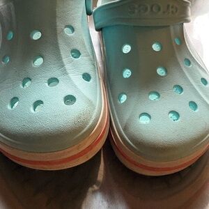 CROCS Teal Slip-On Clogs with Pink Accent Stripe